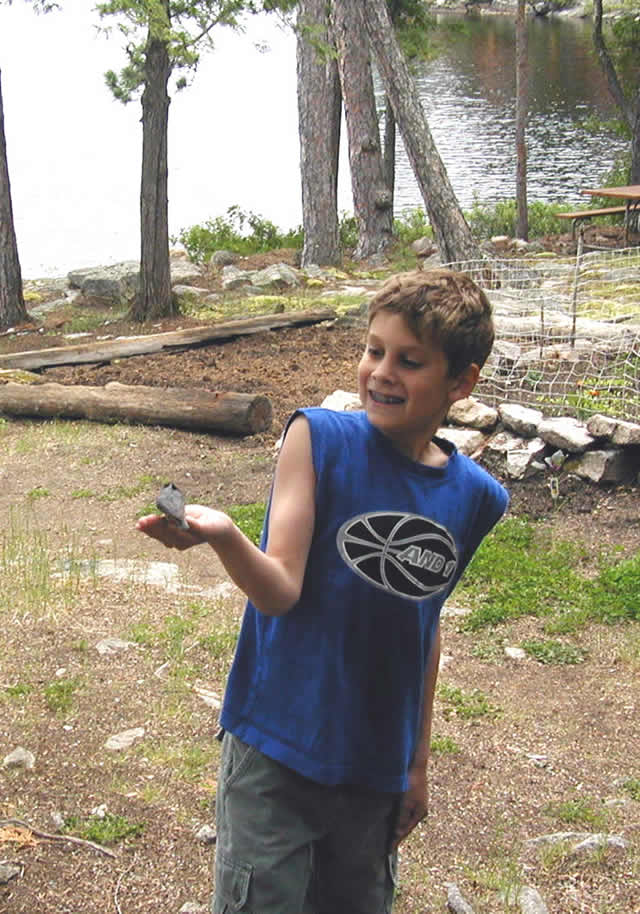 hand feeding a redbreasted nuthatch